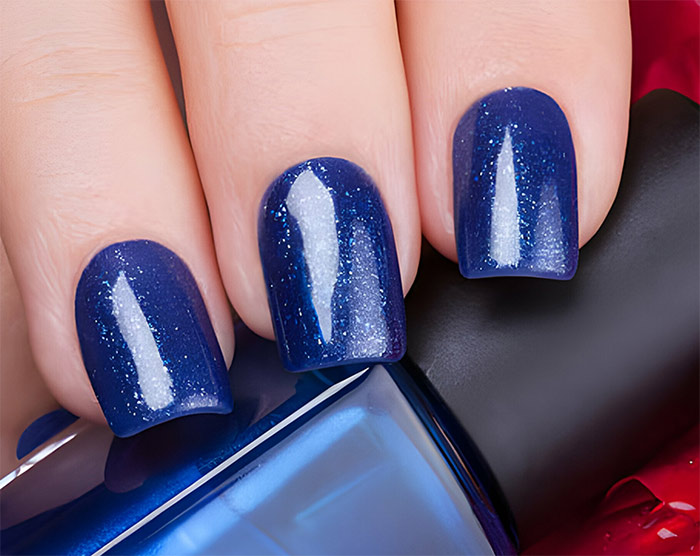 Navy blue nails with Glitter
